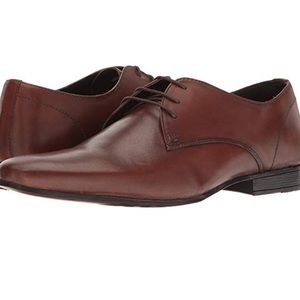 Kenneth Cole Shop-ping List Derby